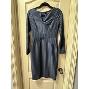 Navy blue pinstripes dress with cross cross pattern to snatch the waist. Size s